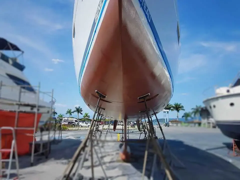Large-Sailing-Yacht-On-Hard-Stands-with-new-Coppercoat-Antifoul-Paint-Bow-View